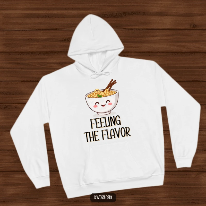 Funny hoodie with a smiling ramen bowl and wiggling chopsticks doing a jig, embodying humorous comfort and food joy.